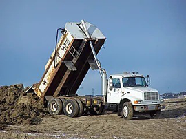 Tandem Truck used by Scorpion Construction for construction material delivery