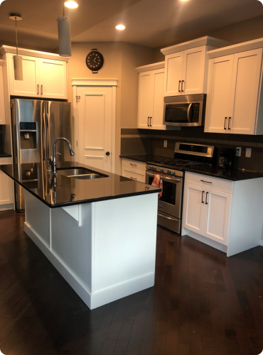 New Look Kitchen Cabinet Transformation by Element Painting Inc. in Foothills, Calgary