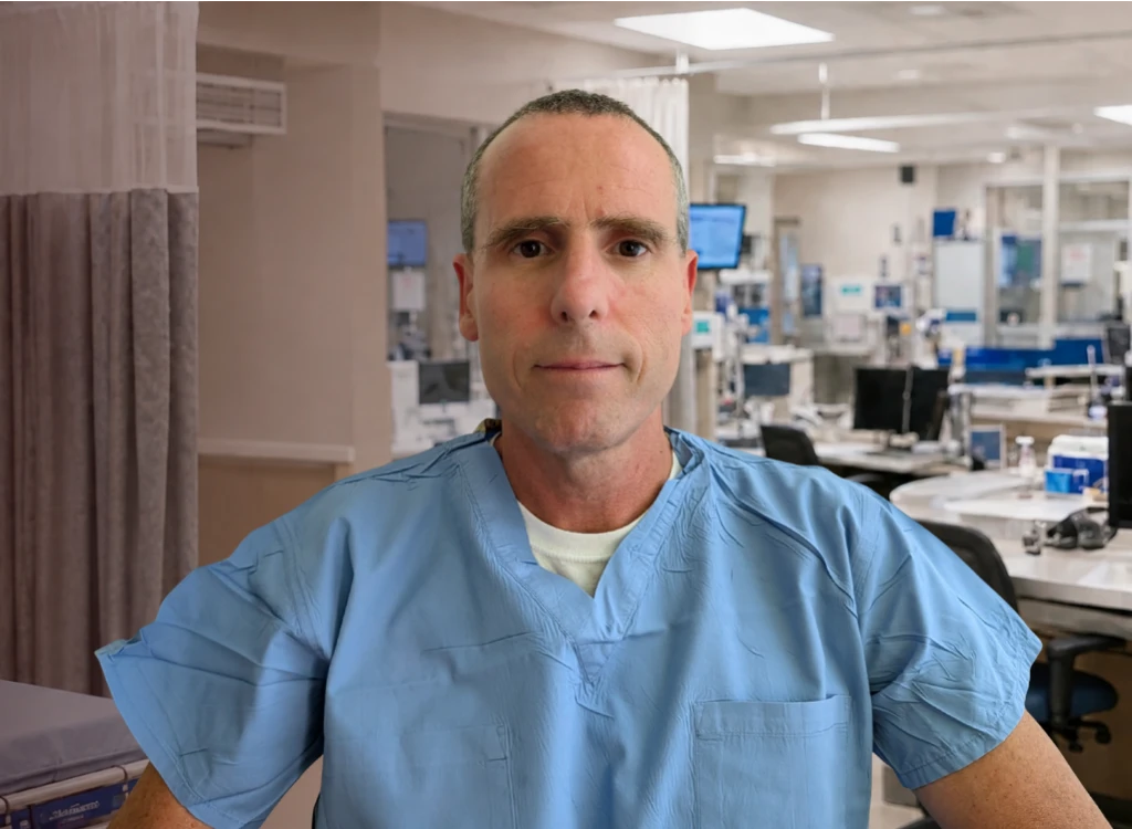 Morris Medicolegal physician expert witness reviewing medical evidence.