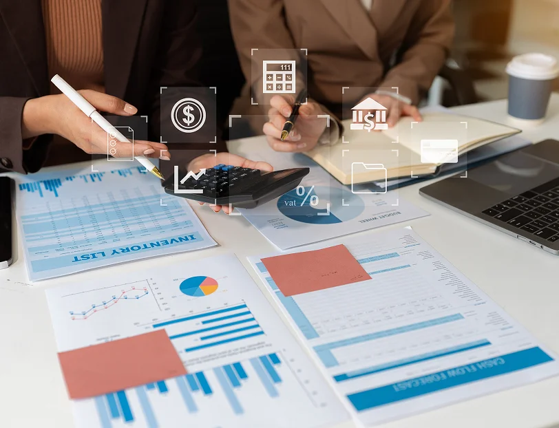 Business owner reviewing financial records with a bookkeeper