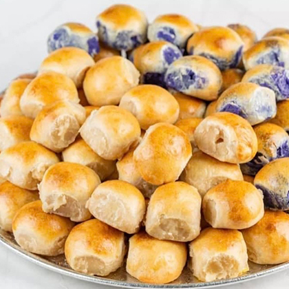 Enjoy Hopia Ube, a Filipino dish prepared with a thin, flaky pastry filled with sweet bean paste