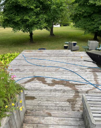 Pressure Washing Services of a deck by Millennium Window Cleaning in Clarksburg, Ontario