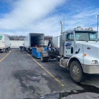Bill Kline Acres Dumpster rental truck loading debris