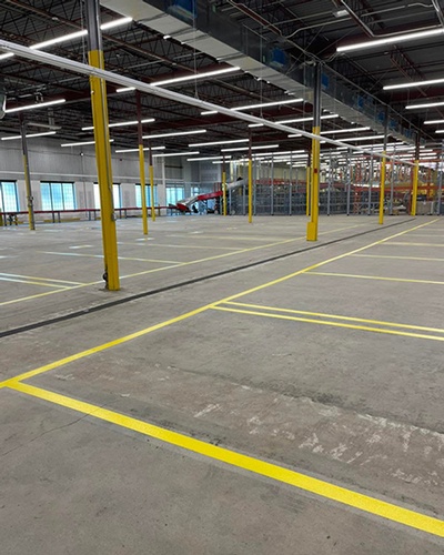 High-visibility Line Painting Services for improved safety in warehouses by QPX Canada