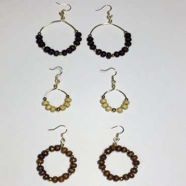 Explore the natural beauty of handcrafted elegance with our collection of Wood-Beaded Handmade Earrings