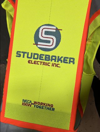 Safety Vest Designed by  - Sierra Pacific Lithographics Inc. - Commercial Printing Company in Sacramento