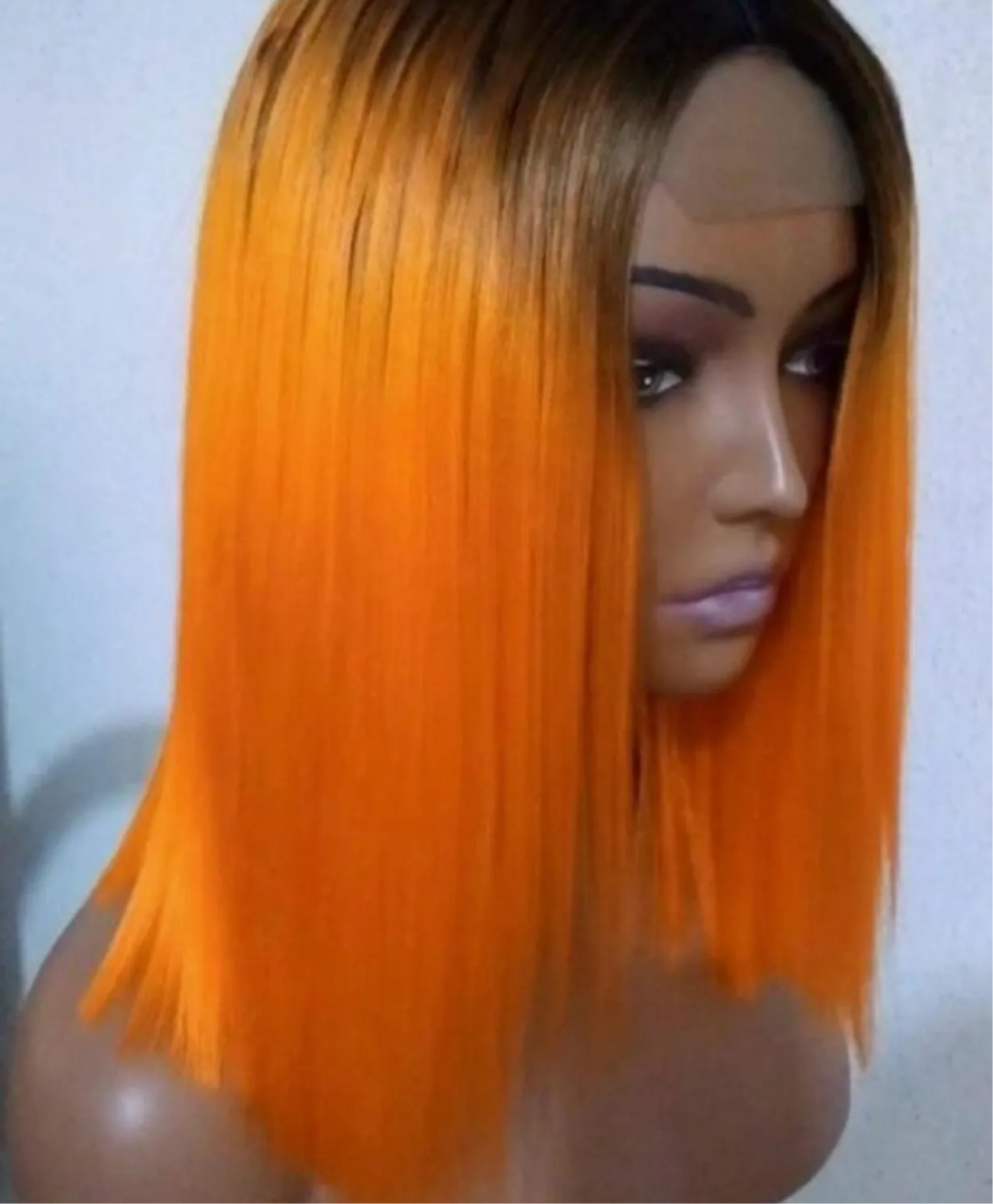 68. 12 inches bone straight super double drawn orange with dark roots wig.