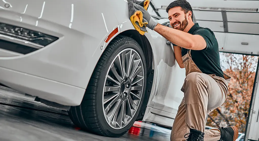 Mobile Vehicle Detailing in Toronto technician hand washing sedan