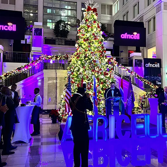 A Breasia Productions corporate gala illuminated by custom lighting and LED wall displays.