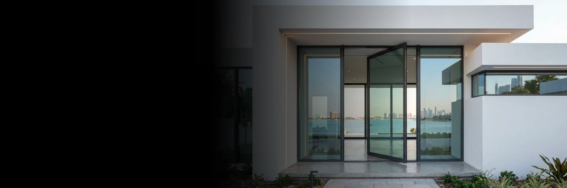 A modern Sydney residence featuring elegant pivot door systems creating a dramatic architectural entrance. and Belgium and Belgium