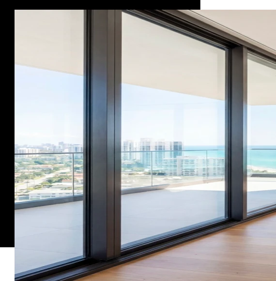 A construction crew installs an aluminum window system in a modern Australian home during an active build.