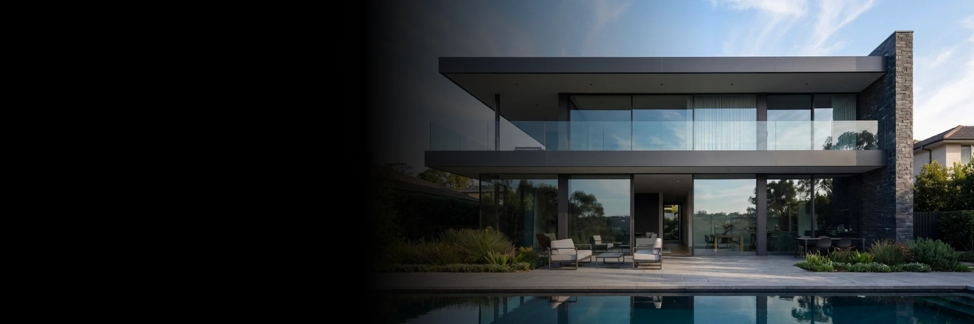 A contemporary living room with wide turn and tilt windows creating a seamless connection to outdoor views.