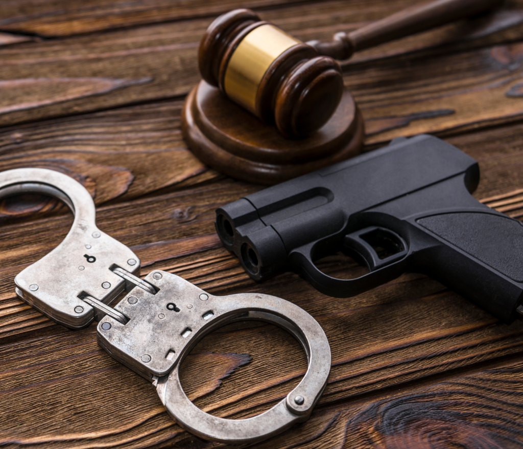  Attorney consulting with client about firearm and gun rights case.