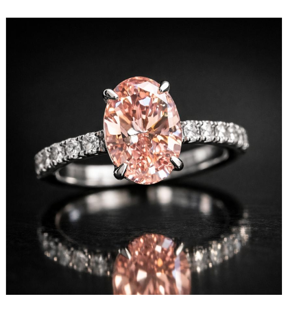 Gold buyers in Jacksonville, FL, reviewing scrap gold and broken jewelry