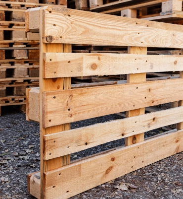 Forklift moving inventory with wood pallet solutions in Sacramento