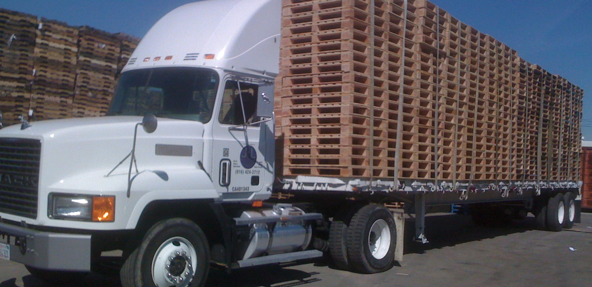Industrial team using wood pallet solutions in Sacramento