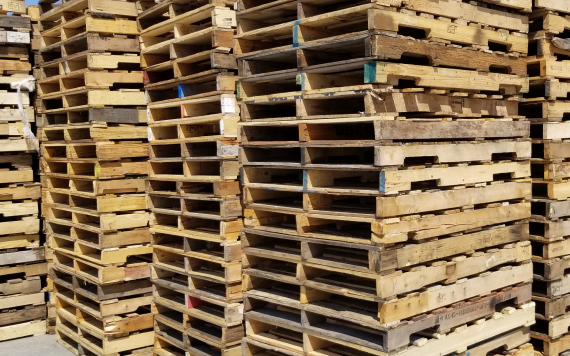 Warehouse receiving loads through industrial pallet management in Sacramento