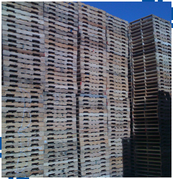 Workers securing materials for pallet shipping