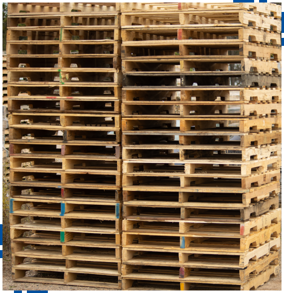 Staff preparing materials for custom pallet services in Lodi
