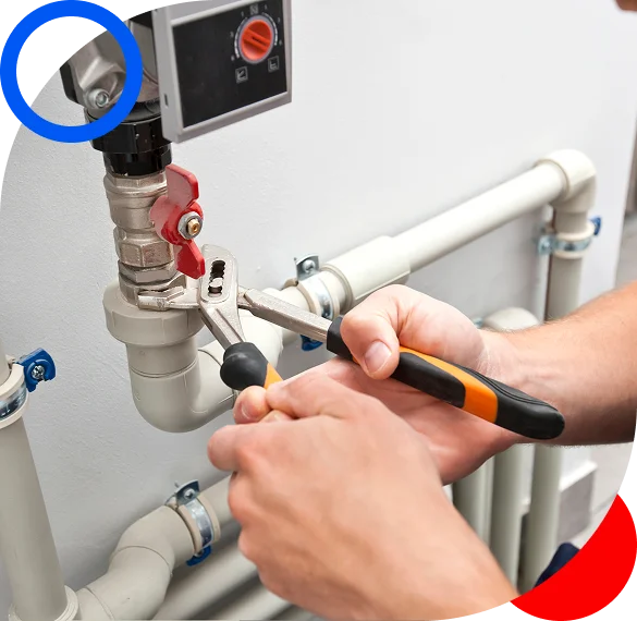 Emergency plumber in Montreal fixing burst pipe
