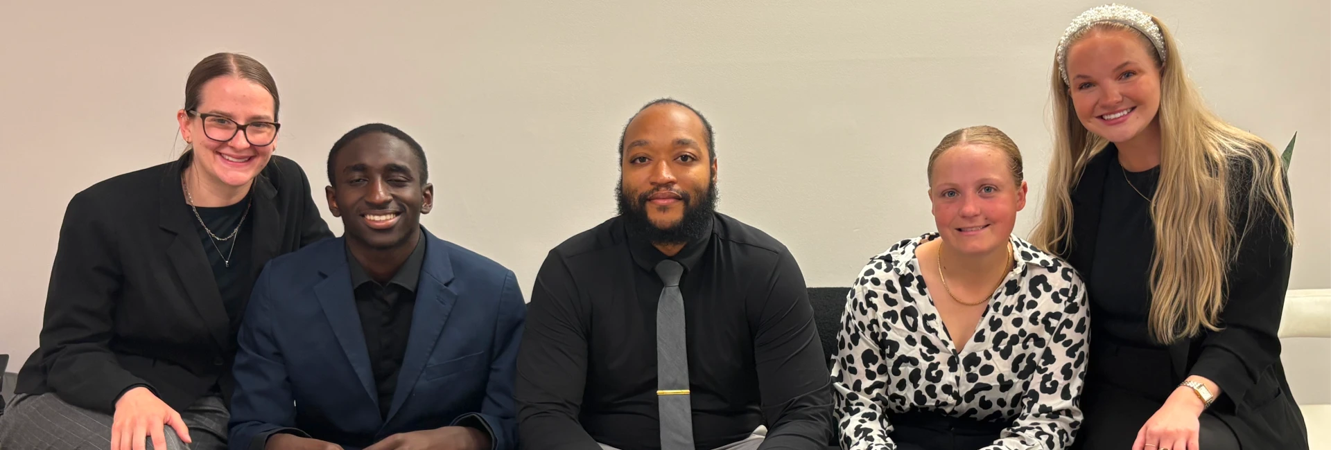 Team reviewing reports for telecom cost reduction planning