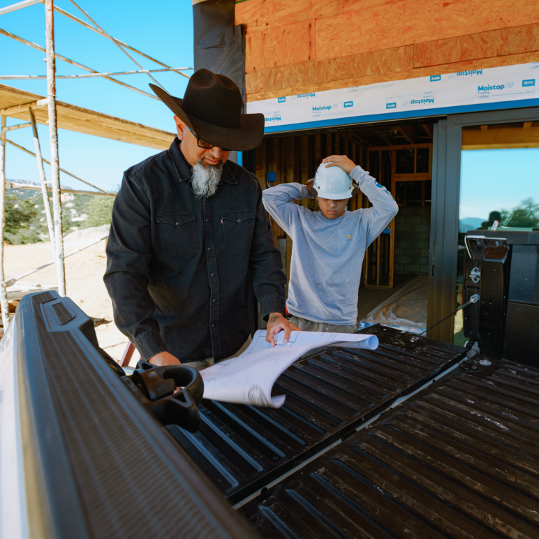 Drywall repair services in Menifee smoothing wall surfaces in an occupied home.