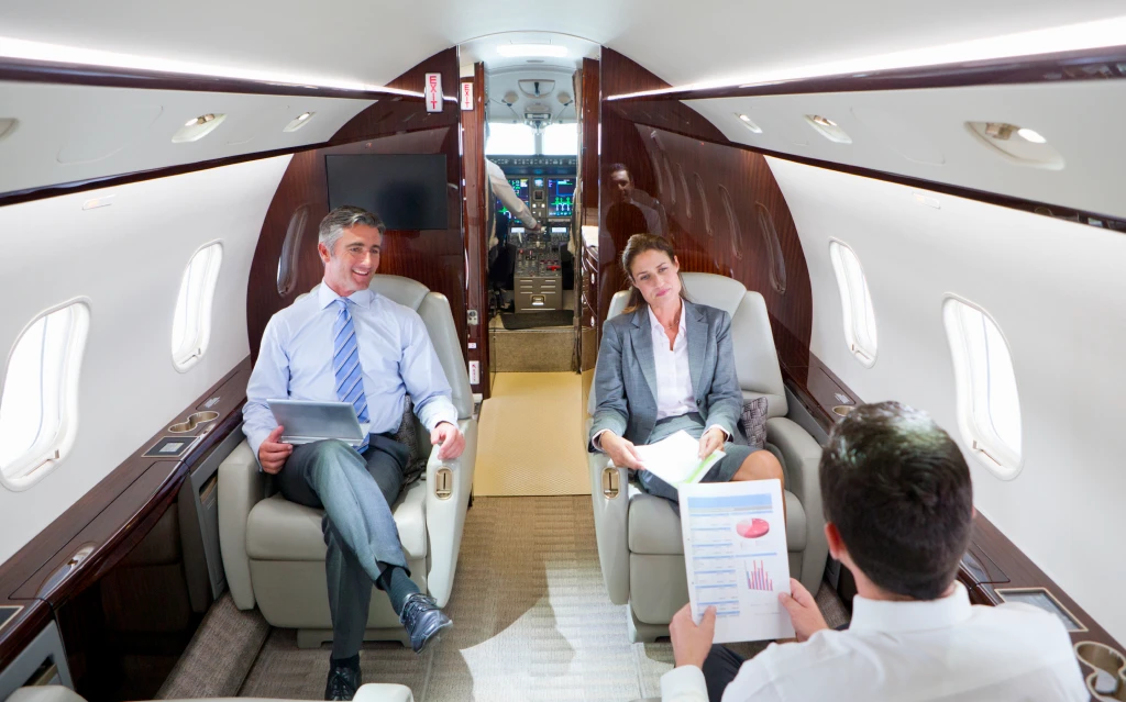 Team reviewing aviation advisory services for airline strategy.