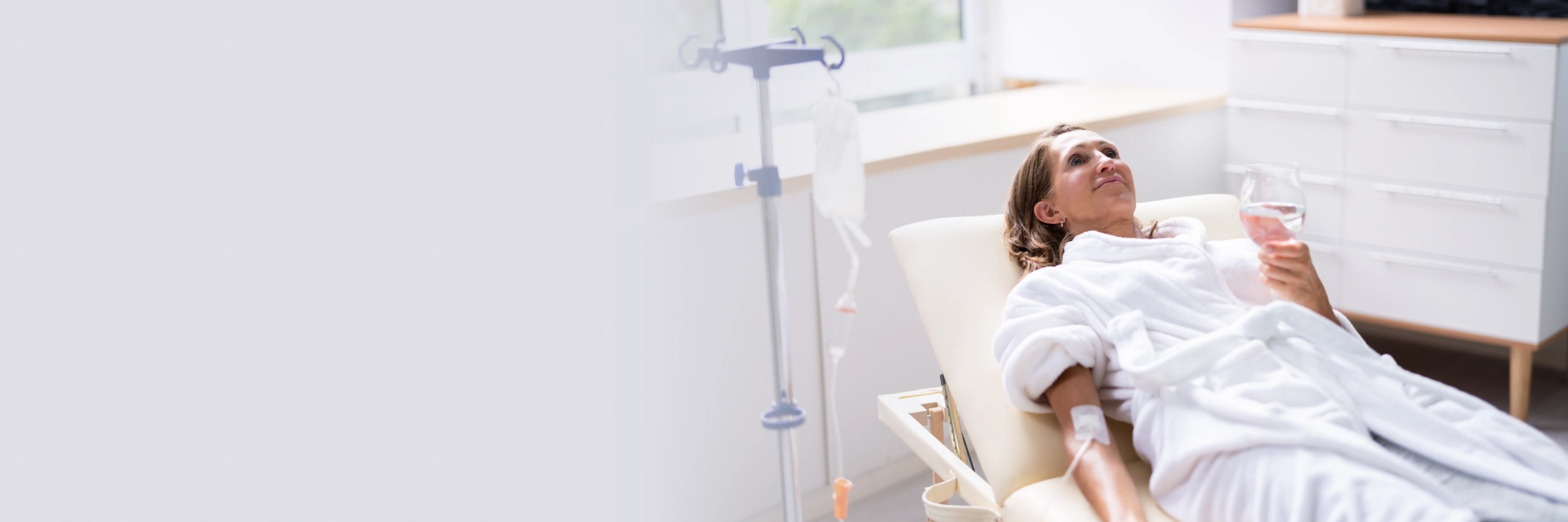 Client relaxing during IV therapy in Minneapolis