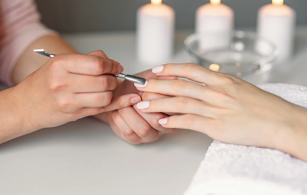 Client enjoying manicure services in West Hartford in a calm room