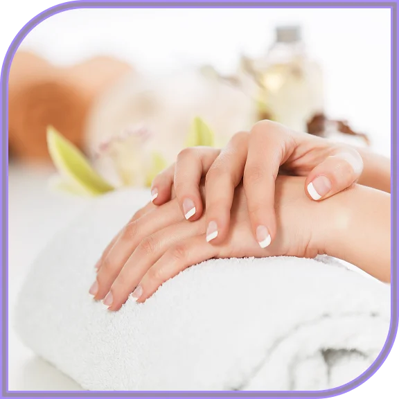 Client showing shiny nails in West Hartford after treatment