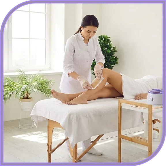Client receiving facial waxing services in West Hartford