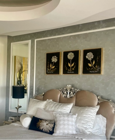 Clients examining fabric and color samples with interior decorating services in Bakersfield.