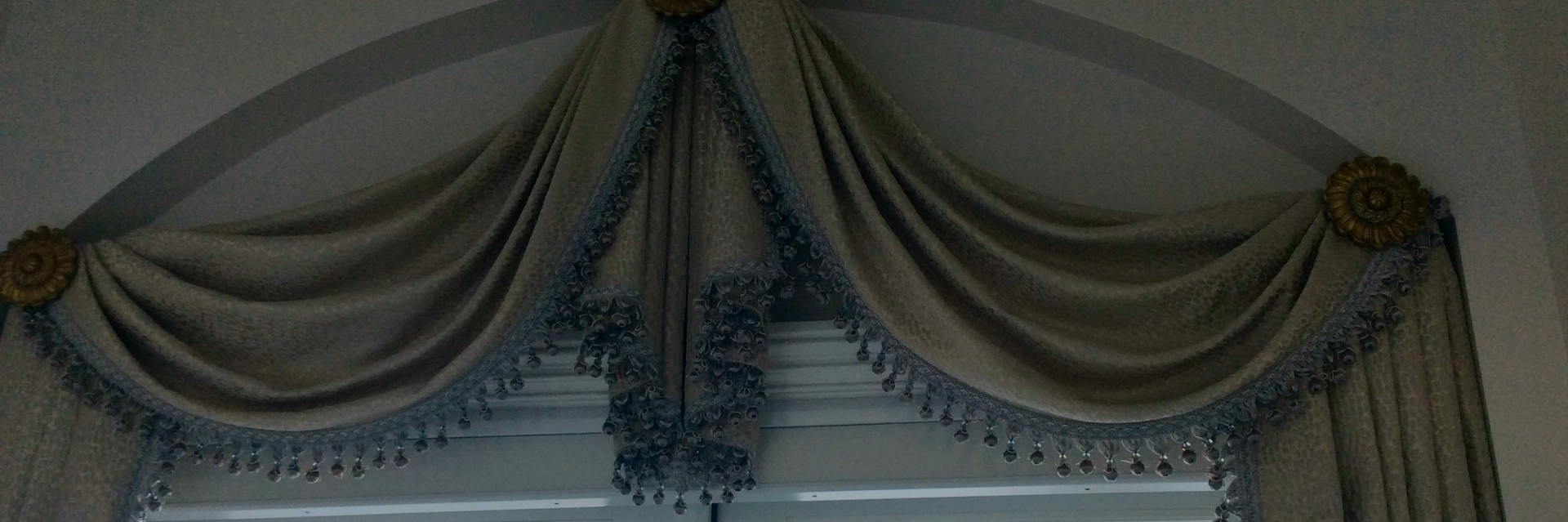 Clients approving designs for custom draperies services in Bakersfield.