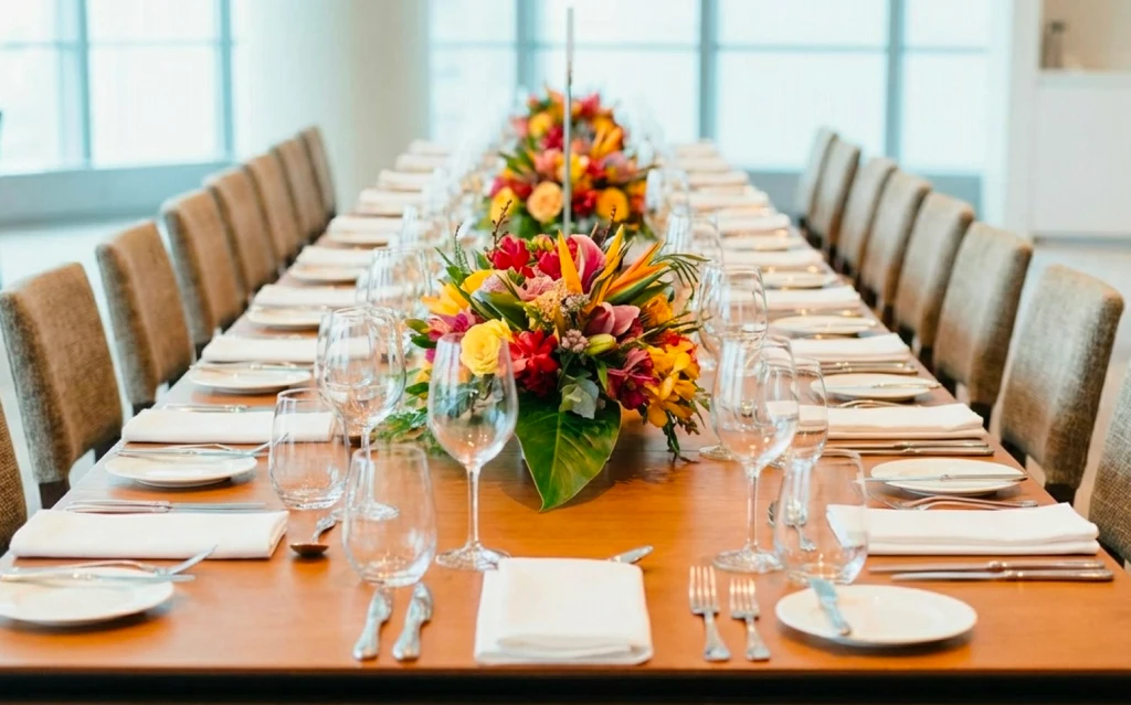 Staff organizing party equipment rental services in Mississauga inside a clean warehouse.