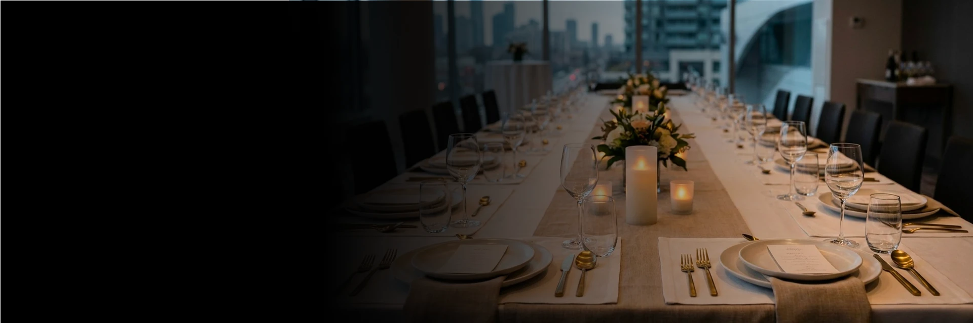 Plates and cutlery prepared for dinnerware rentals in Mississauga at a reception.