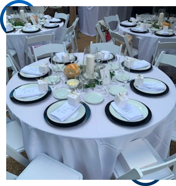 Place settings arranged with table settings services in Mississauga for a banquet event.