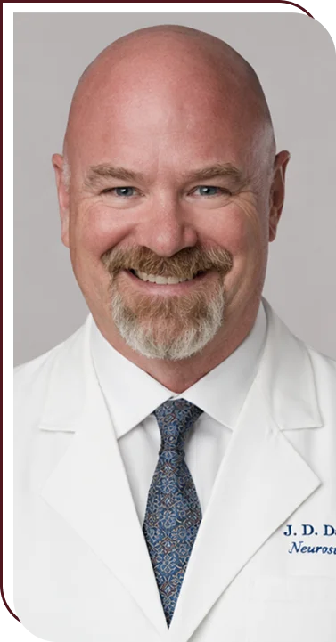 Physician preparing case materials for medical expert witness services in the USA