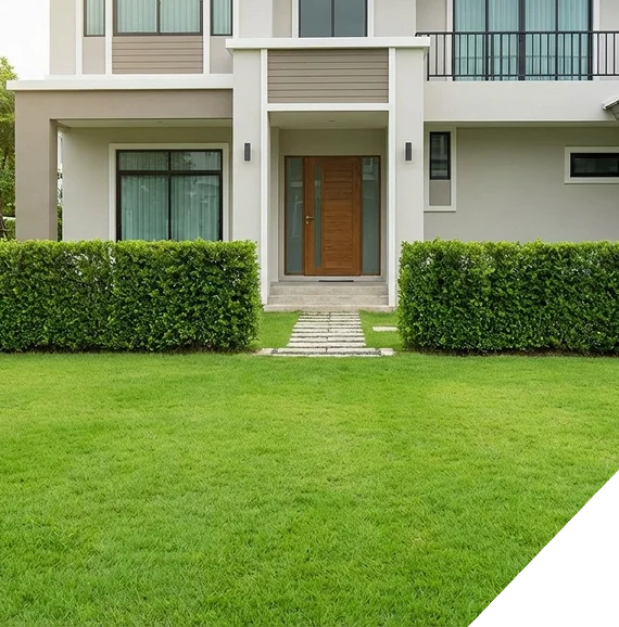 Lawn care services showing garden borders being refreshed with new mulch.