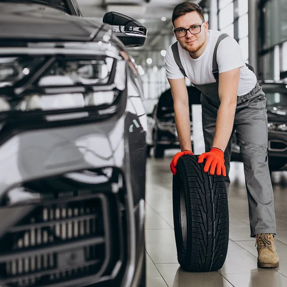 Tires being installed in a modern auto care shop in Strathroy.
