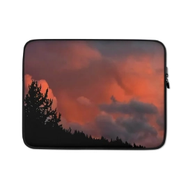 Close-up of vibrant photo printing on luggage showing a sunset over a mountain.