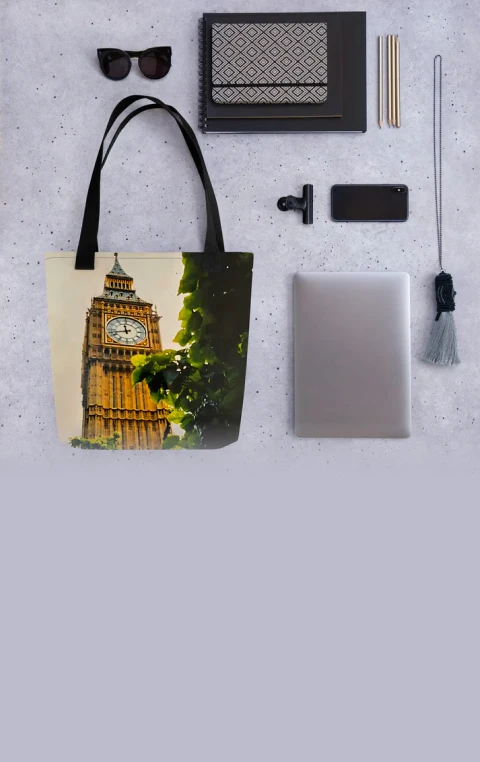 Close-up of vibrant photo printing on luggage showing a sunset over a mountain.