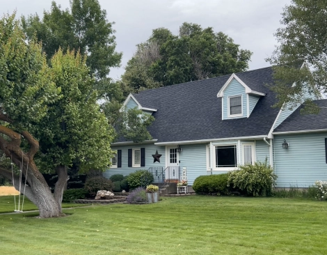 A client meeting with a real estate agent in Spanish Fork, Utah County to discuss pricing strategy and next steps.