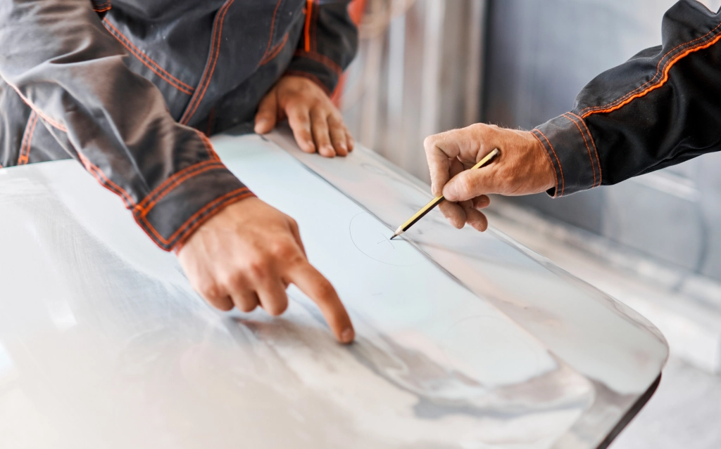 Technician applying autobody fillers in Poughkeepsie, NY
