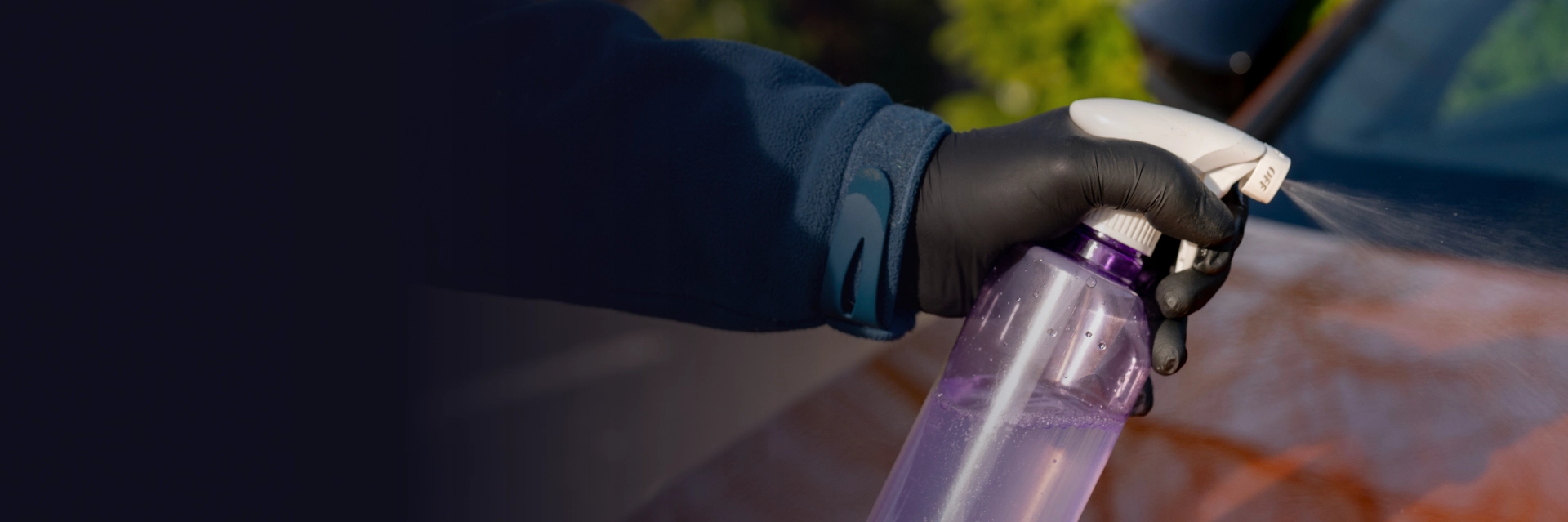 Technician organizing automotive chemicals and cleaners in Poughkeepsie, NY