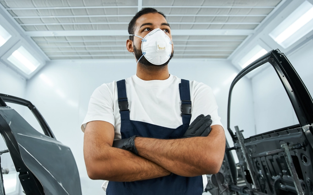 Technician wearing automotive safety gear in Poughkeepsie, NY