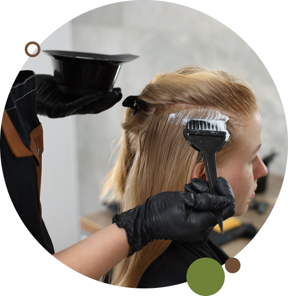 A client discusses menopause hair loss treatment with a stylist in Vero Beach.