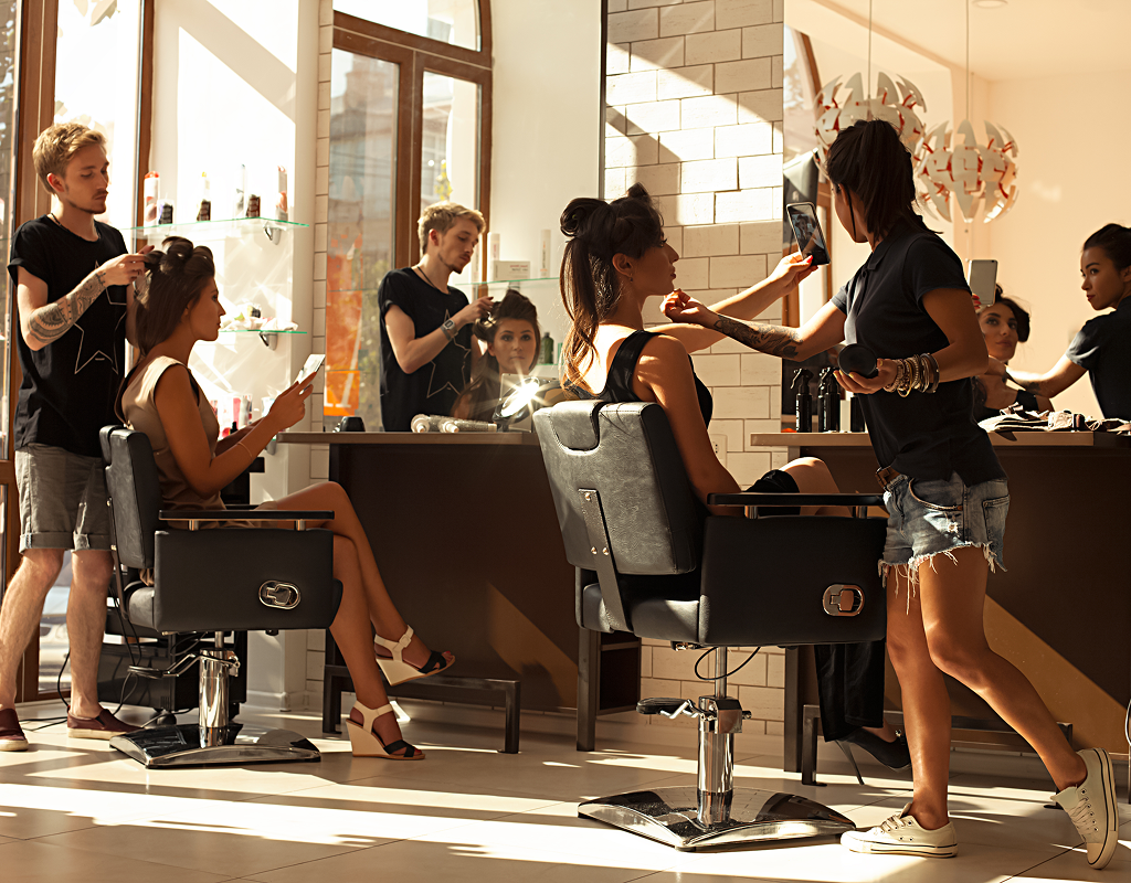 A stylist consults a client at a private hair salon in Vero Beach, FL.


