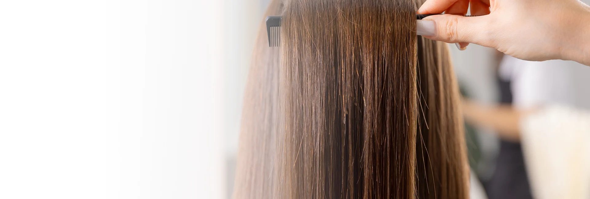 A stylist applies hair coloring in Vero Beach on a client.


