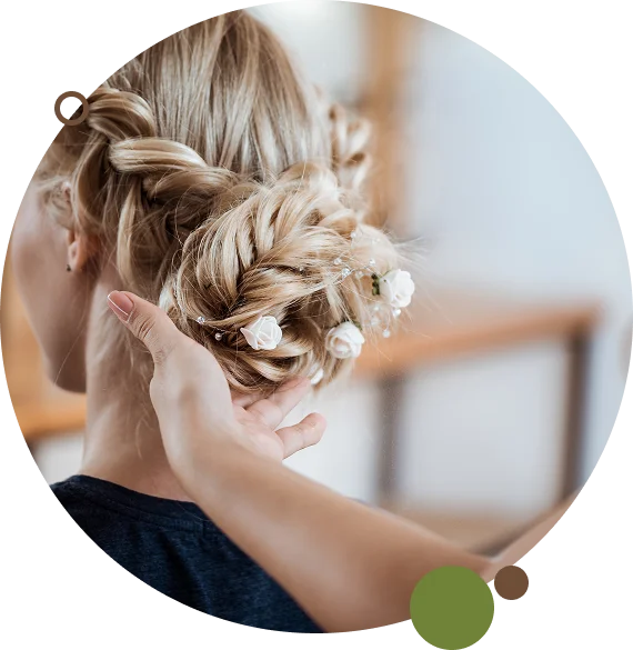A stylist uses a blow dryer for hair blowouts in Vero Beach.