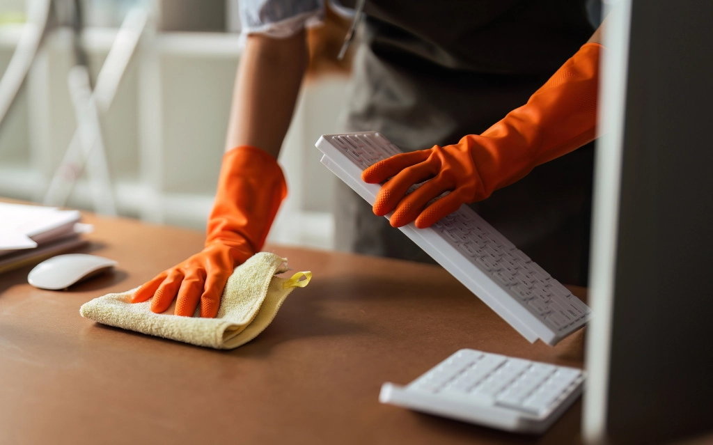 A team of cleaners in Edmonton reviewing a facility maintenance checklist together.